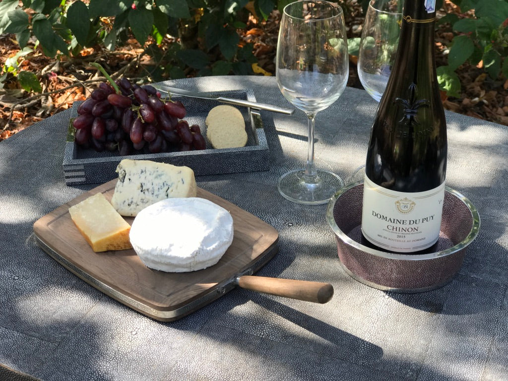 A mulberry shagreen wine bottle coaster