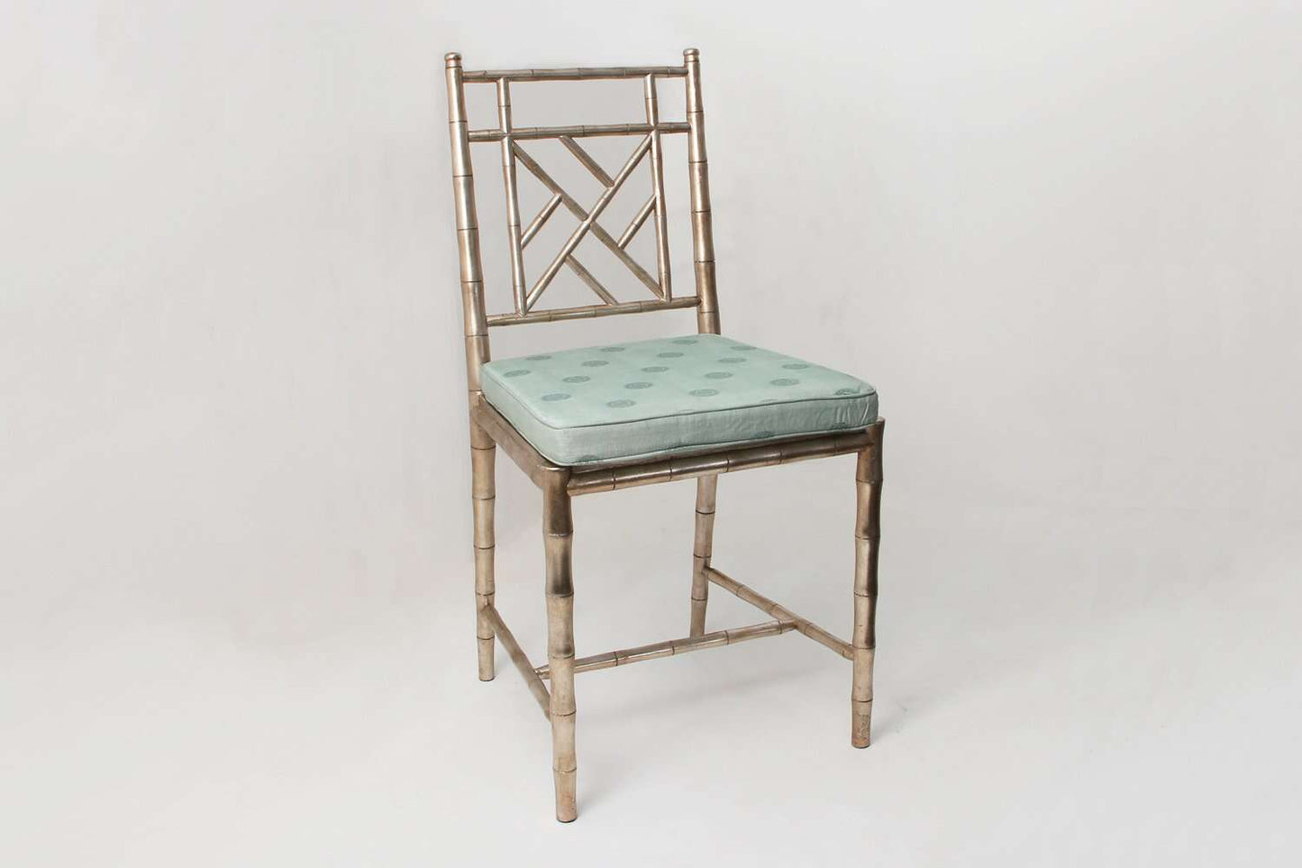 Dining chair in antiqued silver by Forwood Design