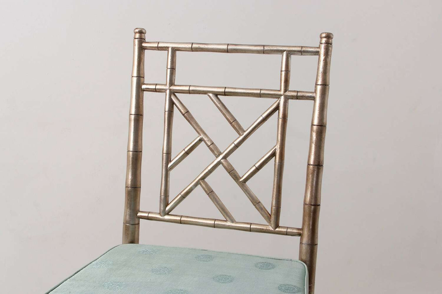 Dining chair in antiqued silver detail