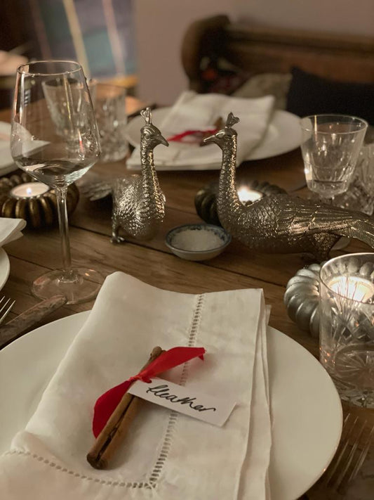 Tealights and peacock table decorations