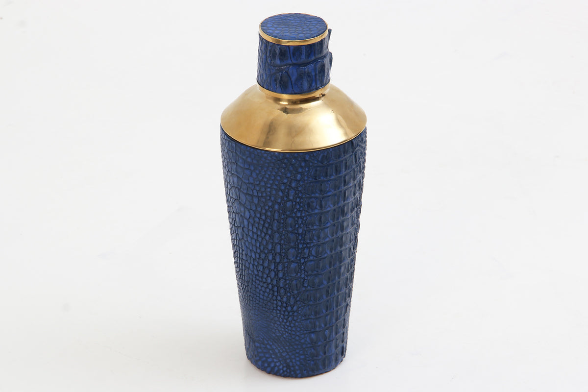 Luxury blue crocodile cocktail shaker with polished brass detailing and stainless steel interior