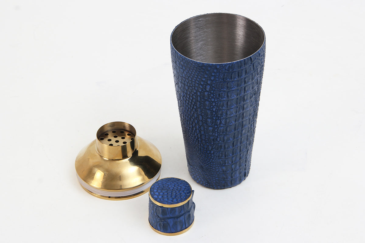 Blue crocodile cocktail shaker showing removable lid, integrated strainer and stainless steel construction