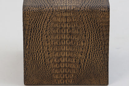 Close-up of hand-crafted square tissue box holder featuring detailed crocodile finish.