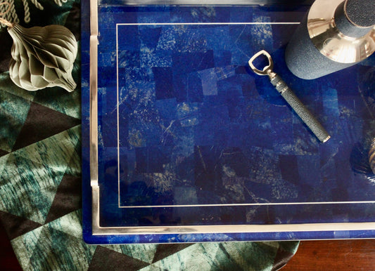 A luxurious blue Lapis Lazuli drinks tray with a stainless steel edge and handles