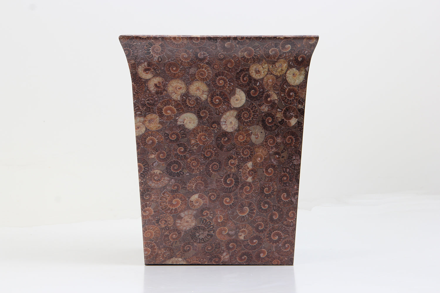 Unique waste paper bin in an ammonite finish