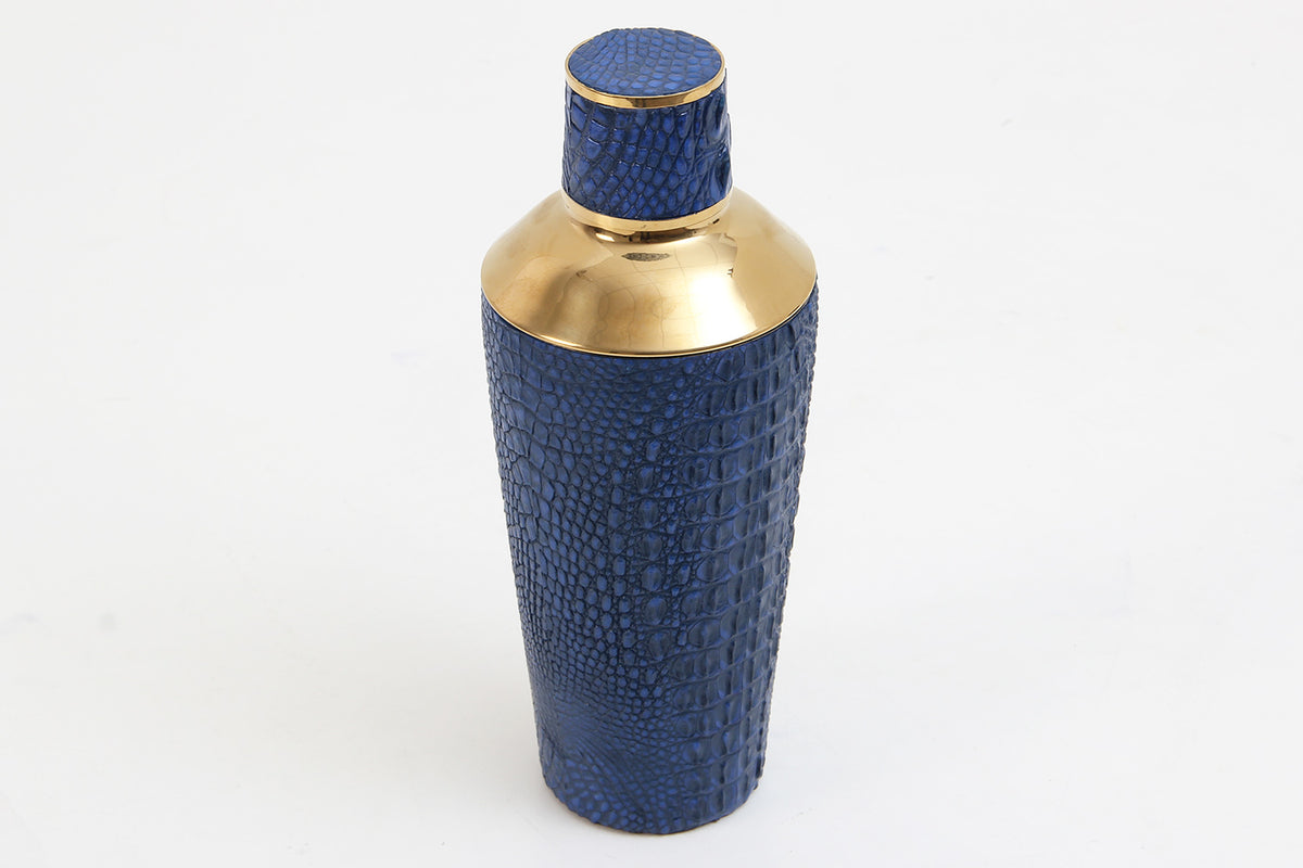 Elegant blue faux crocodile cocktail shaker with brass accents for sophisticated barware collections