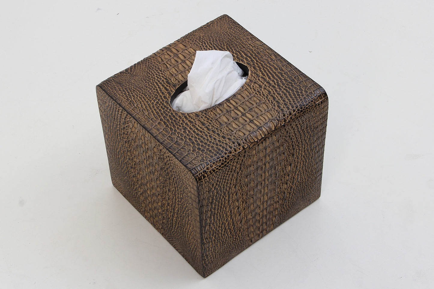 Square tissue box holder, touch of refined luxury.