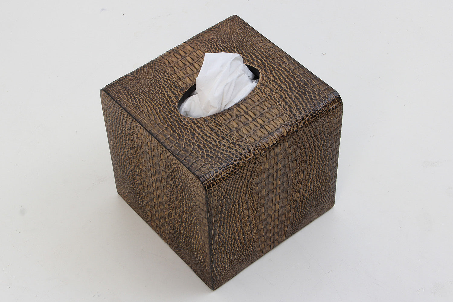 Square tissue box holder, touch of refined luxury.