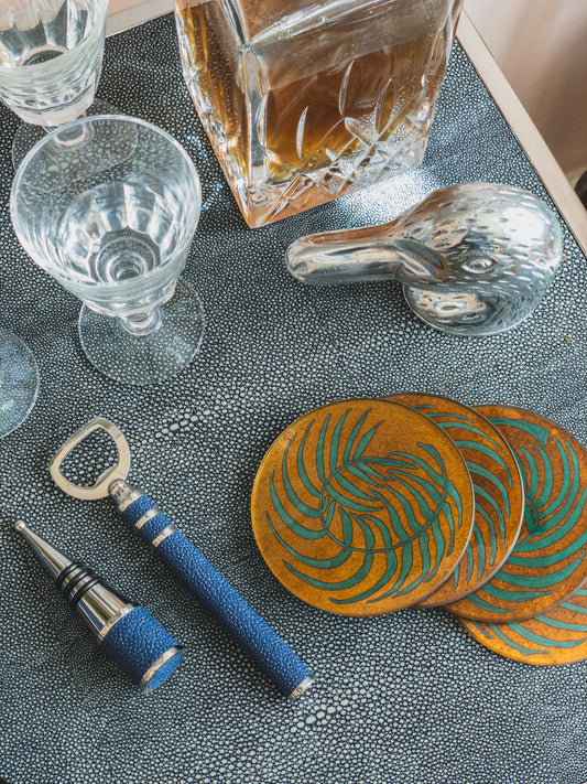 Bottle opener and wine bottle stopper in stainless steel and Nile Blue Shagreen