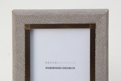 Close-up of dune shagreen photo frame with elegant antique brass inlay