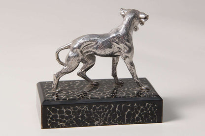 stylish Dog-table-sculpture in cast stainless steel