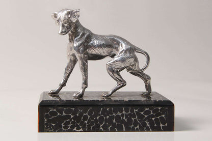 Adorable Dog-table sculpture in cast stainless steel. Table ornament