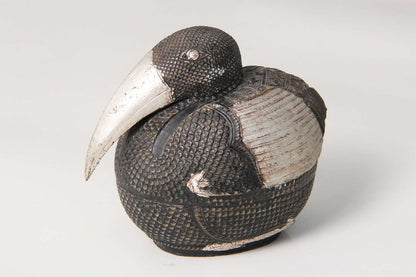 Silver sculpture interior Cambodian pelican bird sculpture